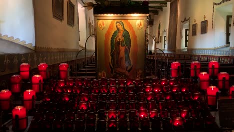 Prayer-candles-flickering-in-the-dimly-lit-Chapel-of-St