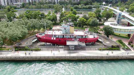 Hong-Kong-waterfront-decommissioned-Fireboat-museum-and-exhibition-gallery-named-after-Alexander-Grantham,-Aerial-view