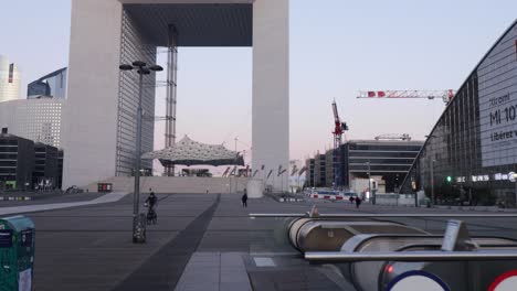 Rer-A-entrance-with-almost-nobody-and-the-great-Arch-of-La-Defense-during-early-morning-in-Puteaux