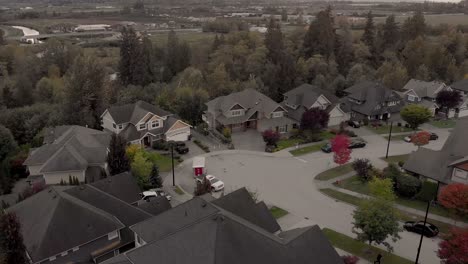 Drone-4K-Footage-Cloverdale-Urban-Housing-for-Middle-Class-Citizens-Zoned-City-Planning-at-Cul-de-Sac-with-truck-pulling-a-trailer