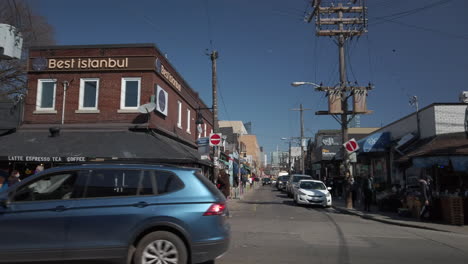 Wide-left-to-right-panning-shot-of-the-busy-corner-of-Baldwin-and-Kensington-in-Kensington-Market