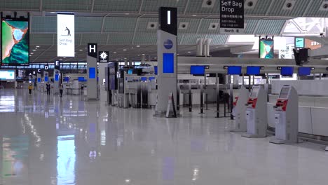 Empty-Narita-Airport-in-Japan-with-no-people-and-blue-screens-due-to-corona