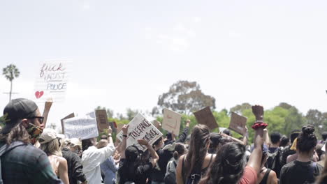 Crowd-of-Protestors-Show-Signs-at-LA-Black-Lives-Matter-Rally,-Slow-Motion