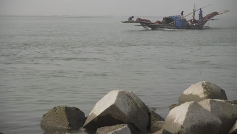 Motor-driven-fishing-vessel-is-moving-fast-through-the-river-water