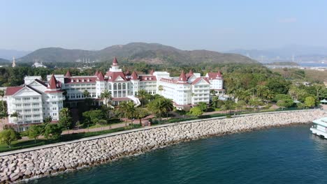 Disneyland-Hotel-and-park-in-Hong-Kong-empty-and-closed-for-visitors-due-to-covid19-lockdown-guidelines,-Aerial-view