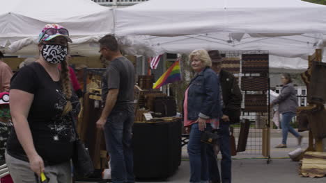 People-wearing-face-masks-during-Dogwood-Festival,-Siloam-Springs,-Arkansas