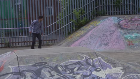 Slow-mo-of-skate-boarders-at-a-skate-park-in-Sheffield,-England