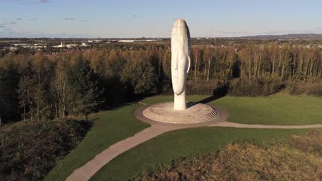 The-Dream-sculpture-Bold-forest-landmark-face-obelisk-statue-aerial-view-St-Helens-wide-pull-back-left