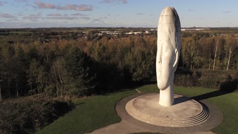 The-Dream-sculpture-Bold-forest-landmark-face-obelisk-statue-aerial-view-St-Helens-low-orbit-left