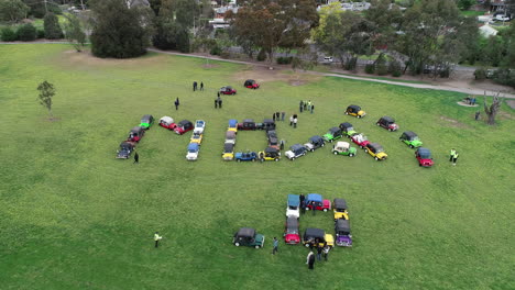 Moke-Owners-Association-50th-Anniversary-Convoy---Moke-enthusiasts-moving-vehicles-into-place