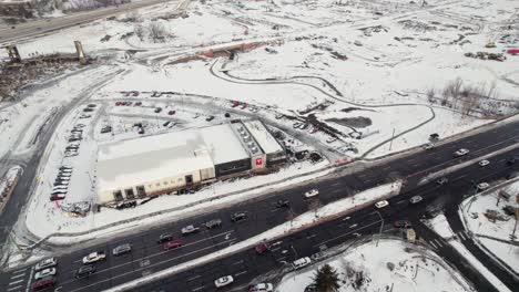 Tesla-Dealership-in-Superior-Colorado-Boulder-County-USA-After-Marshall-Fire-Wildfire-Disaster-Surrounded-By-Winter-Snowfall