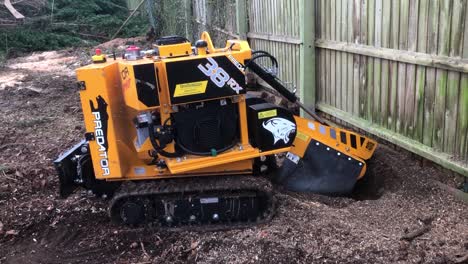 Stump-cutter-removing-a-stump-during-a-site-clearance-job