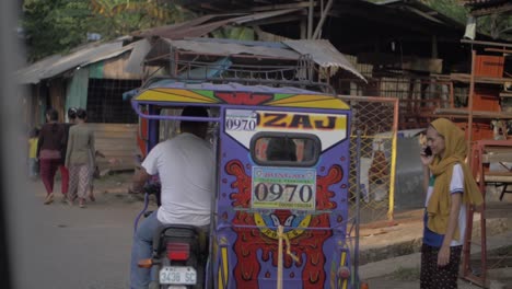 Crowded-narrow-streets-filled-with-people-and-motorcycle-taxis