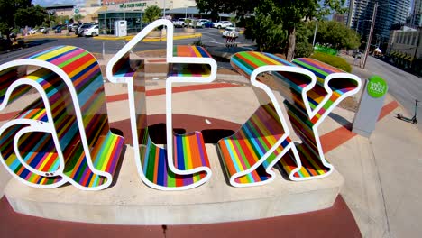 A-nice-steady-smooth-panning-shot-looking-down-at-the-ATX-sign-in-Austin-Texas