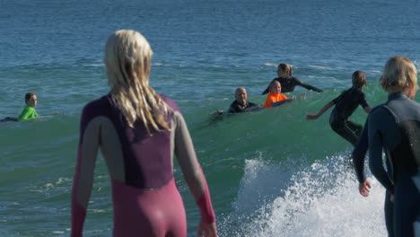 Young-Boy-Enjoying-Surfing,-Riding-Big-Waves-And-Doing-Tricks---Greenmount-Beach-In-Coolangatta,-Gold-Coast,-Australia