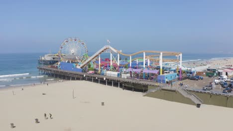 Aerial-push-towards-Santa-Monica-Pier-on-a-sunny-Summer-morning