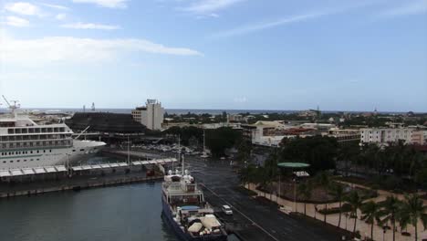 Cruise-ship-at-the-dock-in-the-town-of-Papeete-in-Tahiti,-French-Polynesia