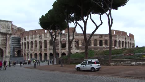 Part-of-Arch-of-Constantine-and-the-Colosseum,-Rome,-Italy