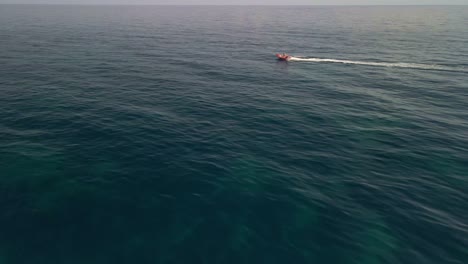 Tropical-Crystal-Sea-with-Speed-Boat-Coming