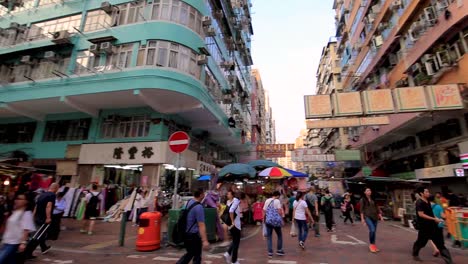 People-walking-at-Sham-Shui-Po-district,-Hong-Kong