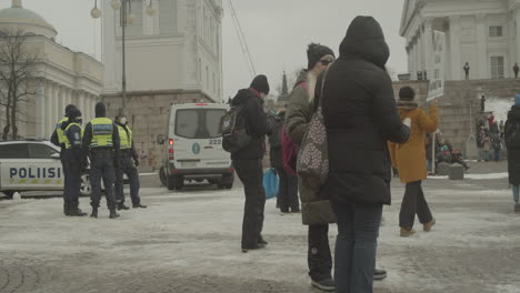 Walking-group-of-people-joining-a-large-protest-in-downtown-Helsinki