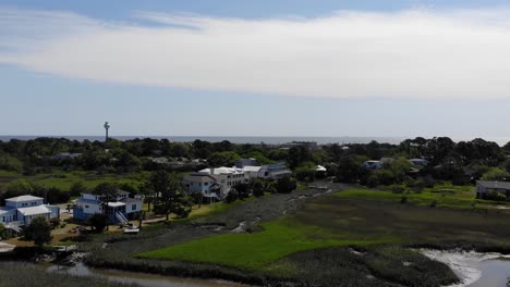 Isla-Tybee-Casas-Construcción-Pantano-Playa-Agua-Torre-Drone-Aéreo