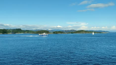 Express-boat-Rygertroll-from-Rodne-company-doing-fjord-sightseeing-during-warm-summer-day---Norway