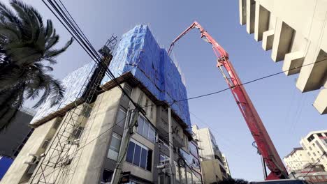 high-rise-scaffolding-using-wood,-sticks-and-bamboo