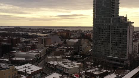 An-aerial-view-of-the-Avalon-Brooklyn-Bay-apartment-building-in-Brooklyn-near-the-subway-station-on-a-cloudy-day-in-the-winter