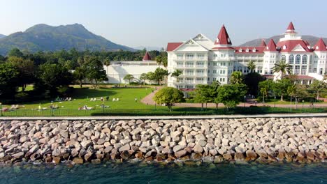 Disneyland-Hotel-and-park-in-Hong-Kong-empty-and-closed-for-visitors-due-to-covid19-lockdown-guidelines,-Aerial-view