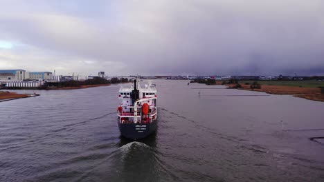 Aerial-View-Of-Stern-Of-Ameland-Cargo-Ship-Along-Oude-Maas