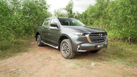 Kuala-Lumpur,-Malaysia--March-19-2022:-Black-Mazda-BT-50-Private-Pickup-car