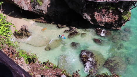 Surfer-paddling-out-for-a-sweet-session-on-the-coast-of-Bali