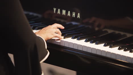 Pianist-playing-on-a-beautiful-grand-piano