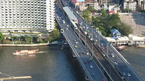 Sunny-day-at-Saphan-Taksin,-Bangkok,-Thailand.-CROP