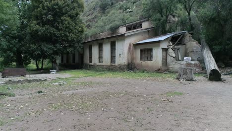 Dolly-in-drone-shot-of-some-buildings-in-the-Mina-Española-Masonica-in-Real-de-Catorce,-San-Luis-Potosi,-Mexico