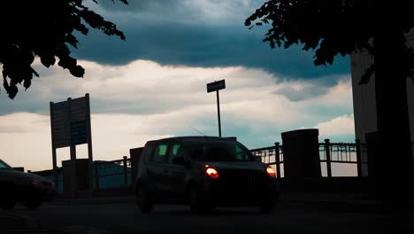 silhouette-Of-Cars-Driving,Workers-Coming-Back-From-Work