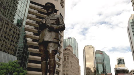 Sir-William-Glascow-monument,-Brisbane's-Anzac-Square,-with-City-Buildings