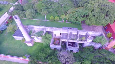 Aerial-view-with-drone-of-the-San-Pedro-Chimay-farm-in-ruins,-which-had-2-chimneys-in-Yucatan