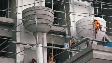 Construction-Worker-Plastering-the-Wall-White