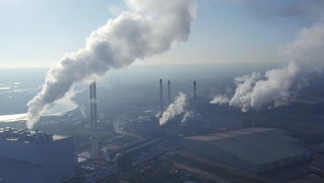 Static-aerial-view-of-Sittingbourne-Industry,-Kent,-UK-with-Kemsley-Paper-Mill-and-K3-power-station-under-construction