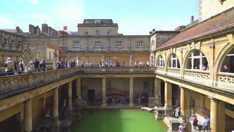 Bath-England,-Circa-:-Roman-Baths,-the-UNESCO-World-Heritage-site-with-people,-which-is-a-site-of-historical-interest-in-the-city-of-Bath,-UK