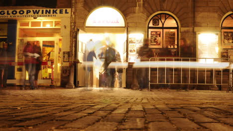 Motion-blur-timelapse-outside-alternative-music-venue-at-night