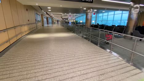 Boston,-Massachusetts---USA---April-9,-2020:-Walking-Shot-Of-Empty-JetBlue-Terminal-C-Gates-at-Boston-Logan-International-Airport-During-COVID19-Pandemic