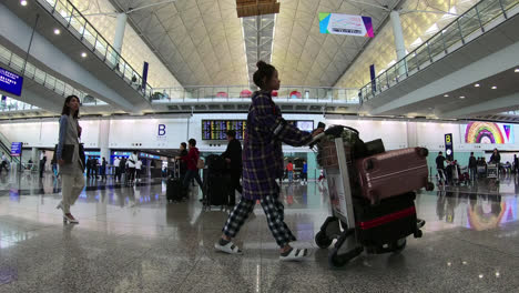 Hong-Kong-China,-Circa:-Timelapse-Lleno-De-Gente-En-El-Aeropuerto-De-Hong-Kong