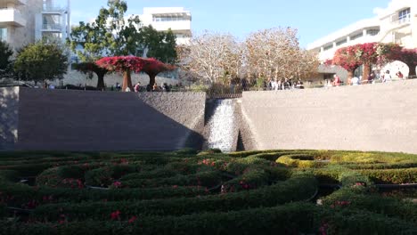 People-walk-among-the-art-in-the-Getty-garden