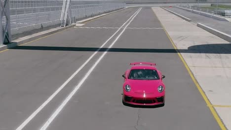 Aerial-view-of-a-racecar-on-a-track