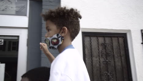 Close-up-shot-of-a-small-boy-protesting-for-the-Black-Lives-Matter-movement