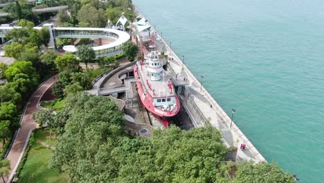 Hong-Kong-waterfront-decommissioned-Fireboat-museum-and-exhibition-gallery-named-after-Alexander-Grantham,-Aerial-view