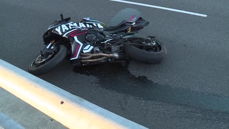 MOTORCYCLE-SKIDS-TO-A-CRASH-ON-THE-ROAD